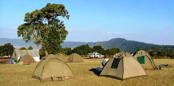 camping, pitching a tent If you really want to enjoy the great outdoors, why not stay in it. Bring your tent!